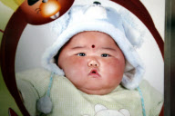 Obese two-year-old weighs as much as adult woman, Taocun town, Shanxi province, China - 06 Apr 2010