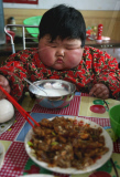 Obese two-year-old weighs as much as adult woman, Taocun town, Shanxi province, China - 06 Apr 2010