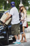 Leonardo DiCaprio and Bar Refaeli Don't Pack Light for the Lakers