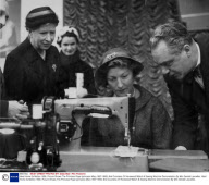 Ideal Home Exhibition 1958. Picture Shows The Princess Royal (princess Mary 1897-1965) And Countess Of Harewood Watch A Sewing Machine Demonstation By Mrs Gerald Lascelles.