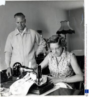 Mrs Dowsett Sewing On Her Sewing Machine With Her Husband Looking On 1961