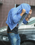 EXCLUSIVE Zac Efron hides while leaving the hospital