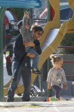 Tobey Maguire and family play at the park