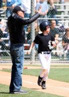 Larry King and Shawn Southwick Cheer on Their Boys