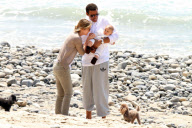 Chris, Ellen, and little Luna Stella soak up the sun asthey walk on the beach in sunny Malibu!!! The family trio, Chris, Ellen, and smiling Stella enjoyed a scenic California coast stroll together with their dogs. 