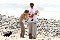 Chris, Ellen, and little Luna Stella soak up the sun asthey walk on the beach in sunny Malibu!!! The family trio, Chris, Ellen, and smiling Stella enjoyed a scenic California coast stroll together with their dogs. 