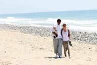 Chris, Ellen, and little Luna Stella soak up the sun asthey walk on the beach in sunny Malibu!!! The family trio, Chris, Ellen, and smiling Stella enjoyed a scenic California coast stroll together with their dogs. 