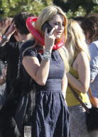 MISCHA BARTON seen wearing a ballon heart around her neck when leaving a party