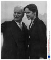 Charles Chaplin (charlie Chaplin 1889-1977) Pictured With His Wife Oona (1926-1991) On The Roof Of The London Hotel (unnamed) Where They Were Staying In 1952.