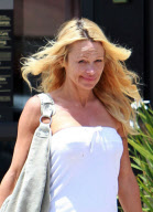 TV personality PAMELA ANDERSON seen without make up shopping groceries in Malibu