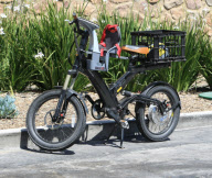 Camilla takes the moped out to pick up some groceries