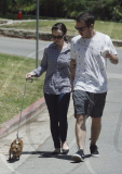 Actress CHRISTINA RICCI shows off her nipples under her gingham shirt while walking her dog with boyfriend CURTIS BUCHANAN