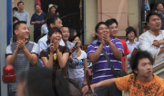 Man threatening suicide dragged to safety by police officers, Kunming, Yunnan province, China - 10 May 2010