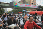 Man threatening suicide dragged to safety by police officers, Kunming, Yunnan province, China - 10 May 2010