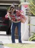 Liv Tyler Rushes Out of the House