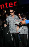 Pout hottie MEGAN FOX and boyfriend BRIAN AUSTIN GREEN leaving the LA Lakers game in Los Angeles