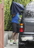 Megan Fox and Brian Austin Green hiding at the gym
