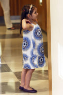 Actress KATIE HOLMES shows off her maltreated feet while shopping with SURI at Barneys New York