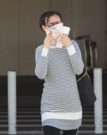 Juliette Lewis Hides Behind Coffee and a Napkin