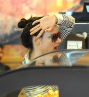 Juliette Lewis Hides Behind Coffee and a Napkin