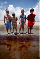 LA: OIL WASHES ASHORE ON GRAND ISLE, LOUISIANA