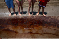 LA: OIL WASHES ASHORE ON GRAND ISLE, LOUISIANA