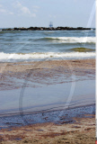 LA: OIL WASHES ASHORE ON GRAND ISLE, LOUISIANA