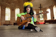 Punker legend NINA HAGEN promotes her new album 'Personal Jesus' in a neon green polyester dress