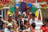 Kelly and Sharon Osbourne get the royal treatment at Los Angeles Pride Parade