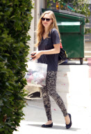 Lovely actress AMANDA SEYFRIED was all smiles and carried a bag of balls of wool as she arrived back home