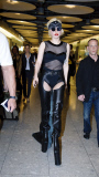 MATRIX Lady Gaga falls over at Heathrow airport