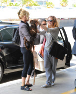 Melanie Griffith Flies Out with Daughter and Dog