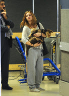 Melanie Griffith Flies Out with Daughter and Dog