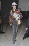 JANE FONDA is carrying her beloved dog TULEA while arriving at LAX