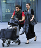 ORLANDO BLOOM AND MIRANDA KERR AT HEATHROW