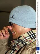 PAMELA ANDERSON ARRIVES AT LONDON HEATHROW AIRPORT FROM LOS ANGELES TO APPEAR ON BREAKFAST TV IN BRITAIN  - 01/02/01