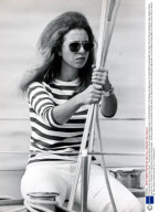 Princess Anne (now Princess Royal) - Yachting & Sailing. Picture Shows Princess Anne In A Red And White T-shirt Making An Adjustment To A Sail Whilst Crewing With Her Father Prince Philip On Board Mr. Owen Aisher's Sloop 'yeoman Xvi' In The Britan