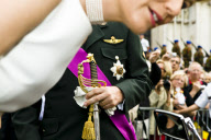 Prince Filip and Princess Mathilde talking to a handicapped person in the crowd after leaving the Cathedral, Brussels.