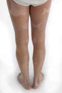 Artist has tan-designs on his body, London, Britain - Jul 2010