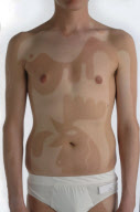 Artist has tan-designs on his body, London, Britain - Jul 2010