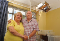 Block of ice possibly from a plane falls through a couple's roof, Chichester, West Sussex, Britain - 22 Jul 2010