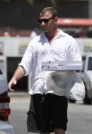 Actor LIEV SCHREIBER picking up pizzas for the family before taking a walk with his son