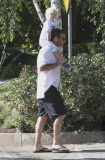 Actor LIEV SCHREIBER picking up pizzas for the family before taking a walk with his son