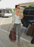Ashley Tisdale and Pooch Fly Out