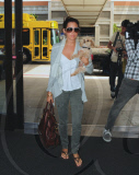 Ashley Tisdale and Pooch Fly Out
