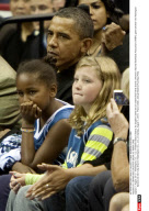 NY: OBAMA AND DAUGHTER SASHA AT WNBA GAME