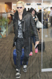 EXCLUSIVE Bleached-blonde Jared Leto with a girl at the airport