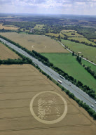Two crop circles featuring the face of Jesus appear in fields either side of a motorway, near Hungerford, Berkshire, Britain - 04 Aug 2010