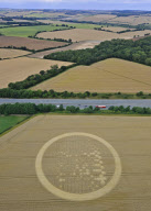 Two crop circles featuring the face of Jesus appear in fields either side of a motorway, near Hungerford, Berkshire, Britain - 04 Aug 2010