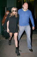 Ke$ha leaves her hotel dressed in leopard printf